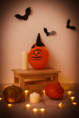 Halloween pumpkins, bats, candles and the lanterns