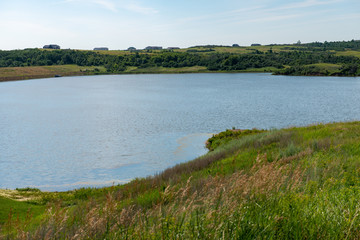 landscape with lake and blue sky