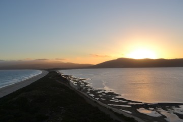 The Neck is a narrow isthmus on Bruny Island in Tasmania at sunset - obrazy, fototapety, plakaty