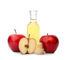 Bottle of apple cider vinegar on white background