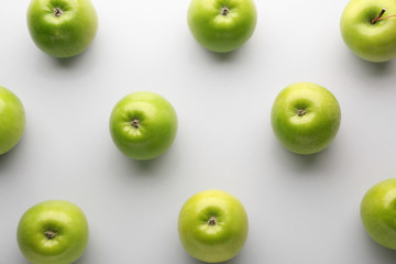 Fresh ripe apples on light background