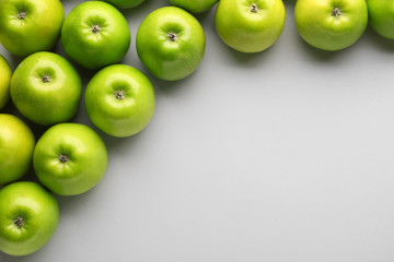 Fresh ripe apples on light background