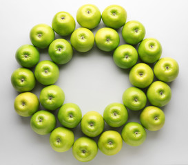 Frame made of fresh ripe apples on light background