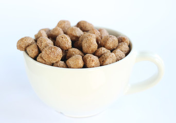 white ceramic mug with cereals