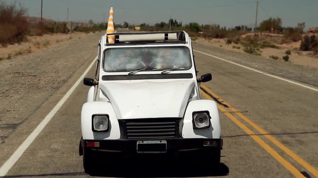 Old White Car on the Road.