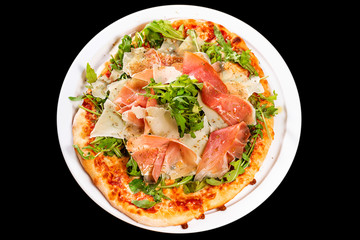 Italian Cuisine. Pizza with prosciutto, ham, arugula and parmesan
