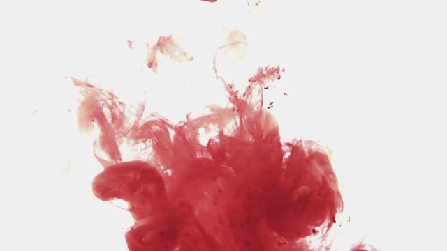 Abstract red ink colour flowing in water