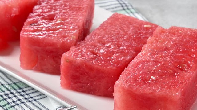 Slider shot over fresh ripe watermelon slices