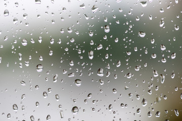 Water droplets on a window after the rain close-up view