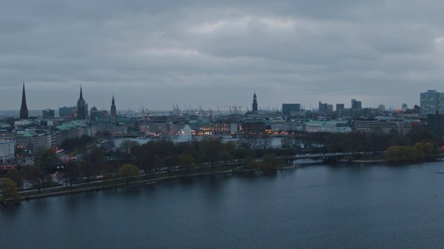 4K Aerial Hamburg city view in the evening from the Alster lake