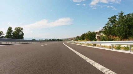 POV, Driving Plate - car driving on a motorway in Bulgaria on a sunny summer day.