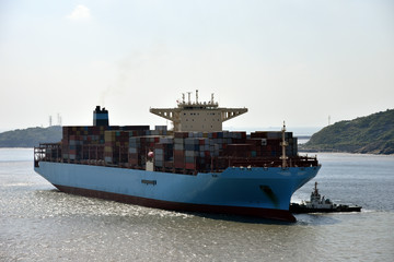 Large cargo container ship arriving to the port of Yangshan, China. 