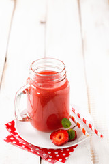 Berry drink. Strawberry smoothie. Berry milkshake. Selective focus. Copy space.