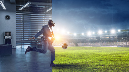 Black Man and Virtual Reality Soccer Match