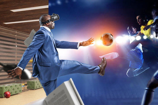 Black businessman on virtual reality football match
