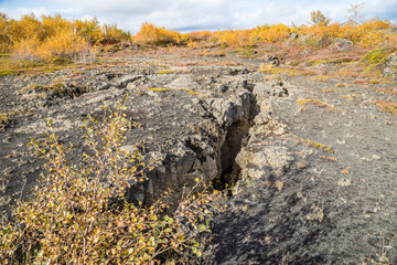 Fissure in lava field of earths crust in Iceland