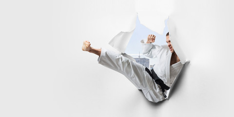 Effect of torn paper with karate beat © Sergey Nivens