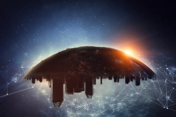Earth with city skyline turned upside down