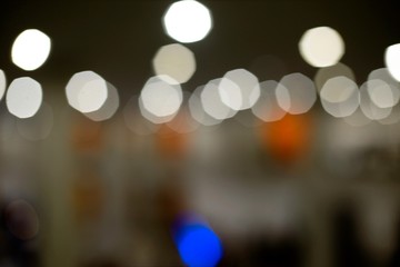 Pleasant, soft background city or hall lights with bokeh and lens flare