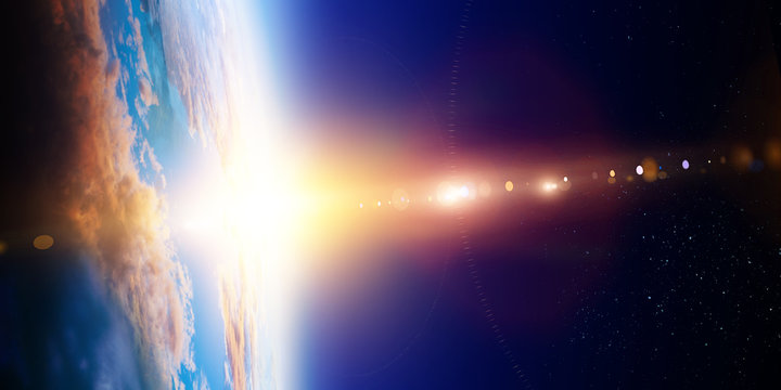 Earth with sunrise on blue space background