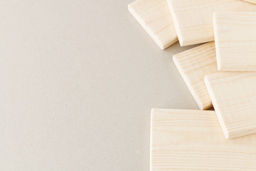 Stack of small planks on grey background