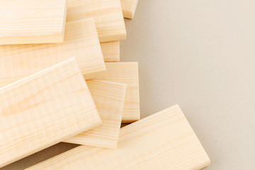 Stack of small planks on grey background