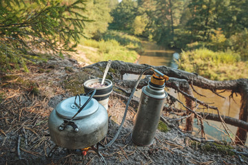 Coffee prepared with the gas burner in the forest.