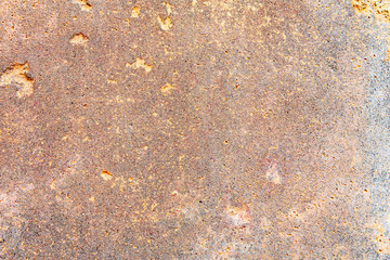 Texture of a concrete wall with cracks and scratches which can be used as a background