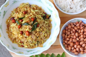 Indian savory snack Chivda or farsan. made out of Flattened rice, fried peanuts, curry leaves and some spices. Traditional Indian Diwali Snacks. Recipe ingredients along with Copy Space. 