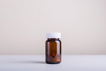 Dietary supplement bottles set on a white background.