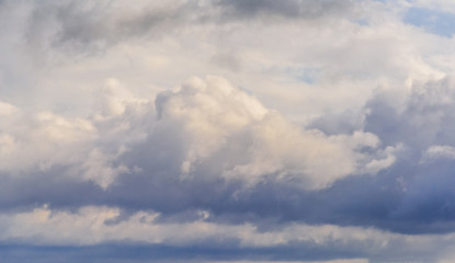 Beautiful puffy clouds isolated against blue skies