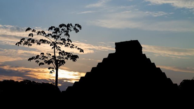 Maya Pyramid: Time Lapse with Mayan Kukulcan Temple in Silhouette at Sunrise, Chichen Itza, Mexico