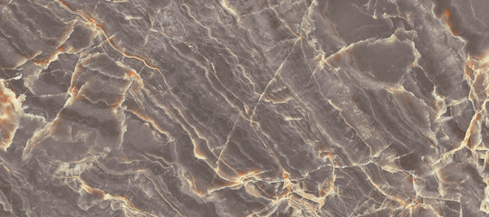 Natural marble stone texture background with yellow curly veins, Brown colored marble for interior-exterior home decoration and ceramic tile surface, Quality stone texture with deep veins.