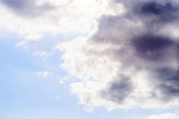 Beautiful puffy clouds isolated against blue skies
