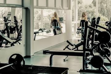 Fitness women work exercise in modern gym