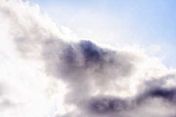 Beautiful puffy clouds isolated against blue skies