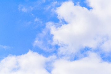 Beautiful puffy clouds isolated against blue skies