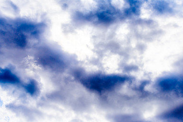 Beautiful puffy clouds isolated against blue skies