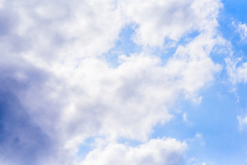 Beautiful puffy clouds isolated against blue skies