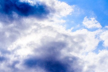 Beautiful puffy clouds isolated against blue skies