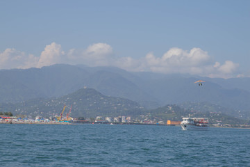 View of the embankment of the city from the sea