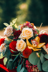 Set of autumn decor outdoors. Floral arrangement of flowers. Details of the wedding ceremony. staging for the newlyweds decorator
