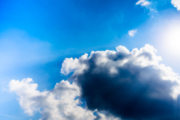 Beautiful puffy clouds isolated against blue skies