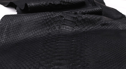 Real black snakeskin python leather.