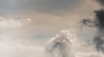 Beautiful puffy clouds isolated against blue skies