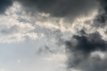 Naklejka na ściany i meble Beautiful puffy clouds isolated against blue skies