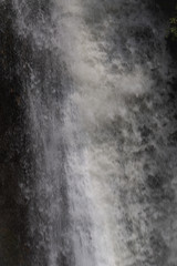 interesting unusual visible on a mountain waterfall on a sunny day for background or screensaver,