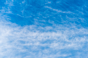 Beautiful puffy clouds isolated against blue skies