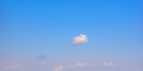Beautiful puffy clouds isolated against blue skies
