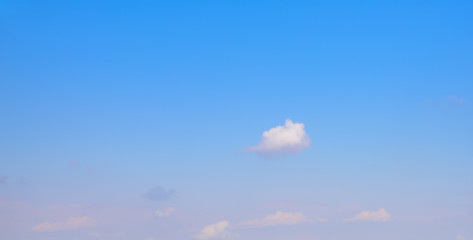 Beautiful puffy clouds isolated against blue skies